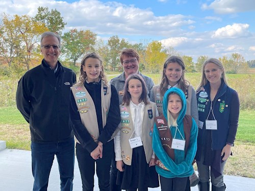 Joe Parisi with girl scouts