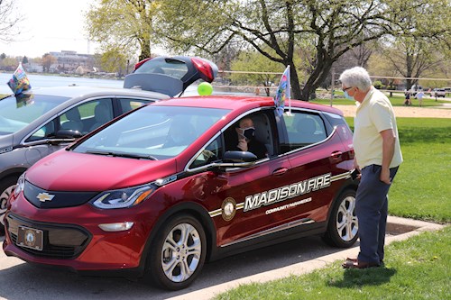 Man speaking to driver in EV